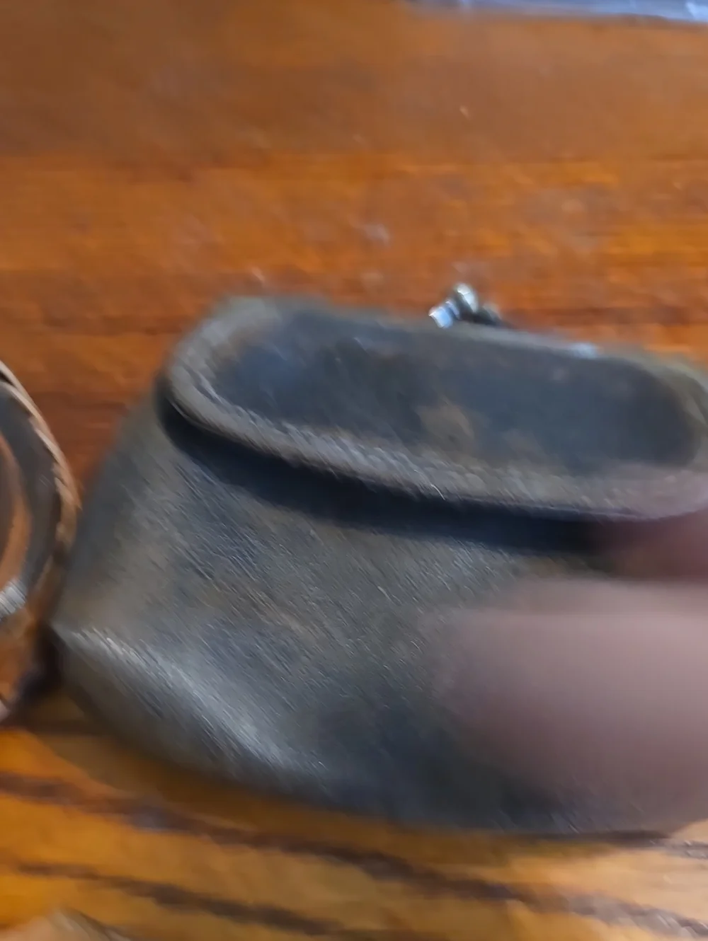 Source Unknown compact leather